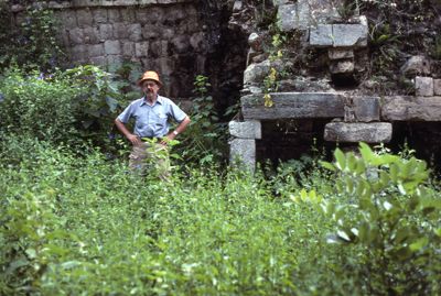 George Andrews standing at archaeological site Balche